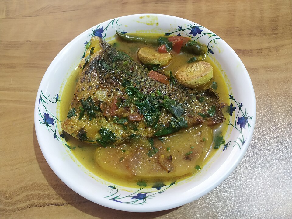 Alu bori tomato diye telapia machher jhol - Traditional India dish