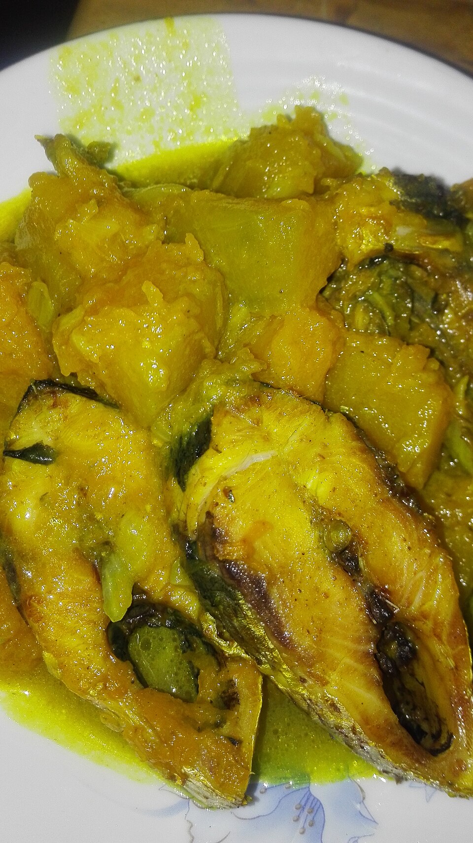 Ilish machher kumro diye jhol - Traditional India dish