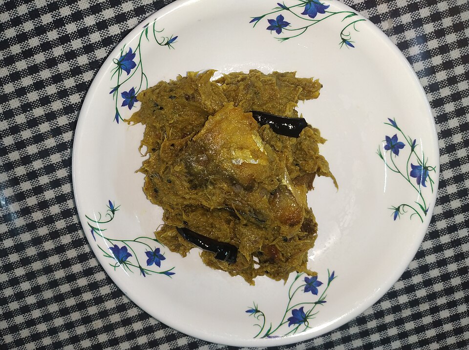 Ilish machher matha diye kochu shaag - Traditional India dish