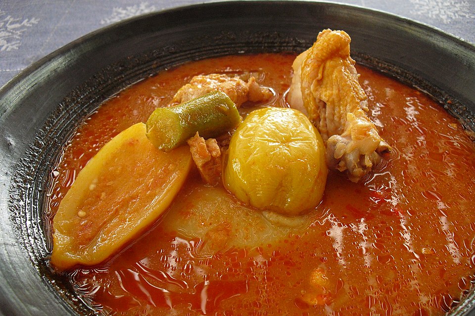 Angwamu (oil rice) - Traditional Ghana Dish | TripEnAI