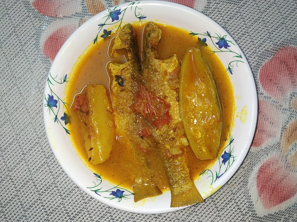 Parse machher jhol alu potol diye - Traditional India dish