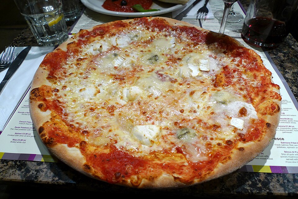 Pizza quattro formaggi - Traditional Italy dish
