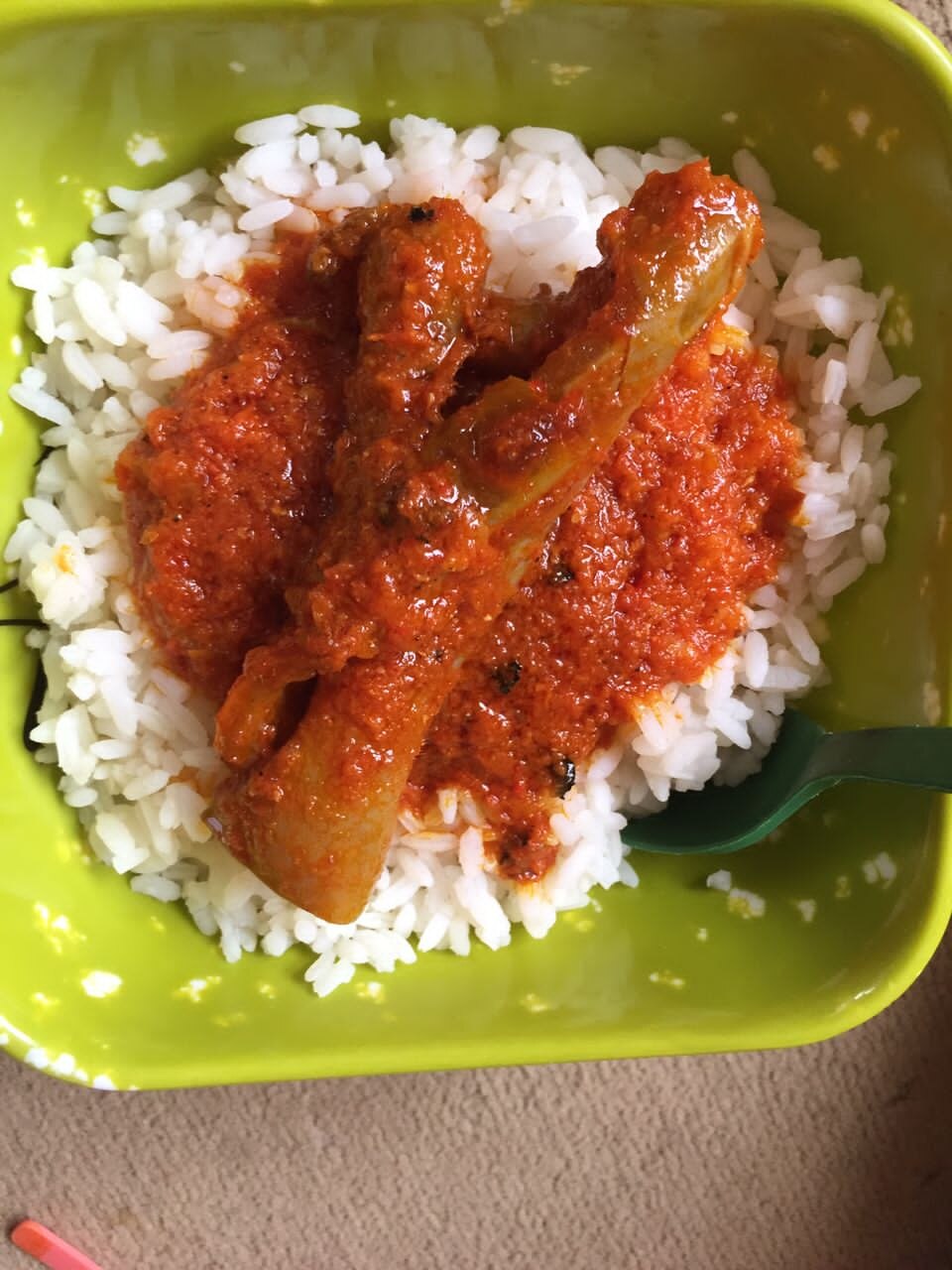 rice and stew with cowskin - Traditional Nigeria dish