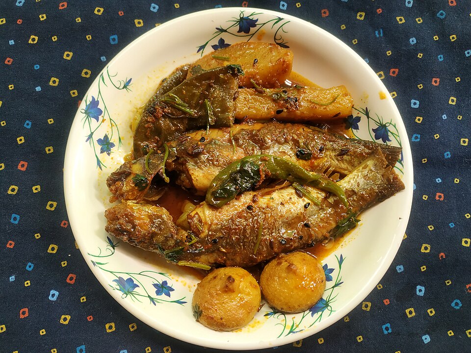 Shim alu bori diye tengra machher jhol - Traditional India dish