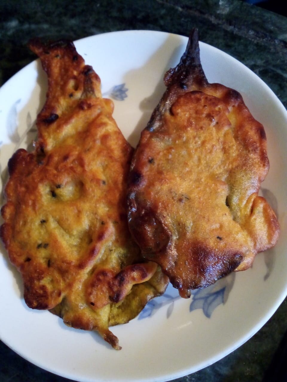Shiuli patar bora - Traditional India dish